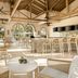 Marriott's Lakeshore Reserve, Orlando: airy outdoor bar and dining area with arched openings and tall stools