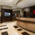 Courtyard by Marriott San Antonio Lackland lobby with curved front desk and modern seating area