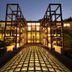 Gora Kadan in Hakone entrance walkway with illuminated glass canopy and modern facade at dusk