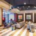Sheraton Lincoln Harbor Hotel in Weehawken lobby seating area with modern lounge chairs and artwork