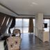 Golden Palas Hotel Çerkezköy guest room with king bed, seating area and large window