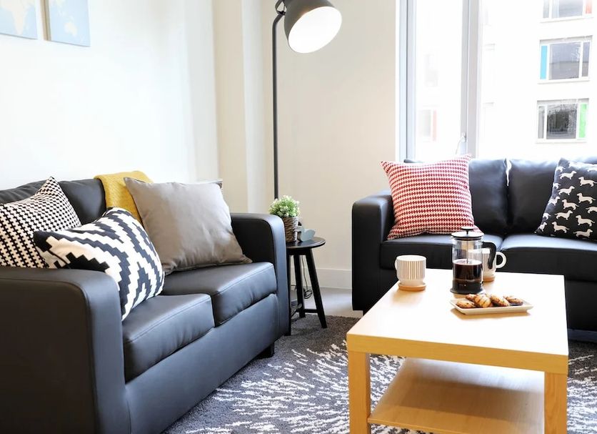 Aparto Dorset Point City Centre Campus Accommodation in Dublin lounge with sofas, coffee table and large windows