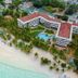 Mombasa Continental Resort in Mombasa with beachfront setting, palm trees, and oceanfront pool
