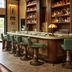 Berkshires Untold in Lenox bar with wooden shelves, green stools, and a long counter