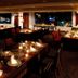 Hirosaki Park Hotel in Hirosaki dining room with candlelit tables and city lights at night
