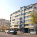 a&o München Laim hotel exterior in Munich with street view and tree-lined frontage
