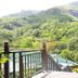 Blue Hill in Victoria with a mountain and lush green valley view from a terrace