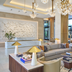 The Crescent Hotel, Fort Worth lobby with chandeliers, seating area, and large windows