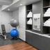 Fairfield Inn & Suites by Marriott San Francisco San Carlos fitness room with dumbbells, bench, exercise balls, and towels