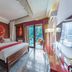 Pandora Vista Retreat Zhangjiajie bedroom with canopy bed and balcony view
