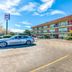 OYO Hotel Houston Southwest I-69 in Houston, exterior view with parking lot and three-story facade