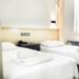 Hotel Guleryuz Antalya triple room with three single beds and white linens