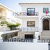 Hotel Borsalino in Porto, white facade with balcony, arched entrance and front stairs
