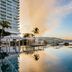 Fiesta Americana Acapulco Villas infinity pool at sunset with ocean and bay views in Acapulco
