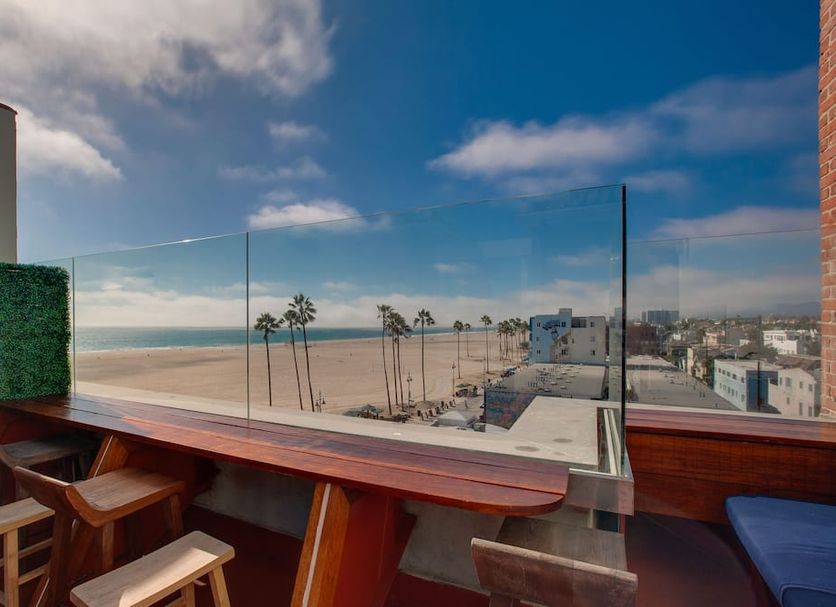 Venice V Hotel in Los Angeles rooftop terrace with ocean view and bar seating