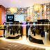 NYX Hotel Mannheim by Leonardo Hotels lobby with glossy front desk and leopard statue in Mannheim