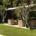 Hotel 4 Stagioni Sensus Spa in Bardolino: garden cabana seating area with canopy and curtains