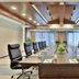 Wonderland Hotel Luxury Hangzhou boardroom with long conference table and black swivel chairs