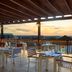 Meliá Llana Beach Resort & Spa Santa Maria rooftop terrace with tables and ocean sunset view