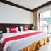OYO 389 Sira Boutique Residence in Patong hotel room with balcony and mountain view