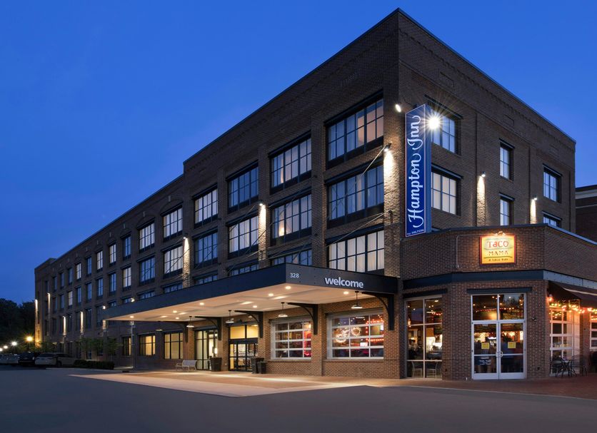 Hampton Inn Huntsville/Village of Providence exterior at dusk in Huntsville