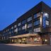 Hampton Inn Huntsville/Village of Providence exterior at dusk in Huntsville