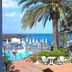 Intercity João Pessoa in João Pessoa with palm trees, poolside seating, and ocean views