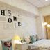 Taipei Star Hotel room with twin beds, HOME wall art, and bedside lamp in Taipei City