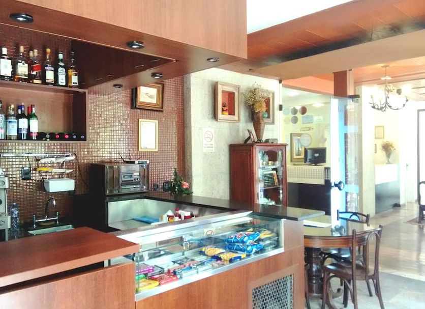 Pousada Minas Gerais in Ouro Preto, bar area with display counter and seating