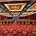 Linyi Hotel (Yimeng Road Branch) in Linyi banquet hall with red carpet, chandeliers and rows of tables