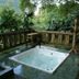 El Refugio Hotel & Spa in Sasaima: outdoor hot tub on a lush jungle-view terrace