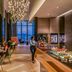 Capri by Fraser, Bukit Bintang in Kuala Lumpur dining lounge with buffet counter and city-view windows