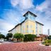 Hotel Indigo Jacksonville-Deerwood Park in Jacksonville exterior with tower and landscaped entrance