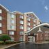 Fairfield Inn by Marriott Greensboro Airport exterior in Greensboro with covered entrance and wet driveway
