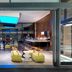 Workinn Hotel Gebze lounge with yellow seating, bar area and bright skylight