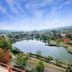 Kagamigaike Hekizantei in Nihonmatsu overlooking a serene lake, hills and colorful autumn trees