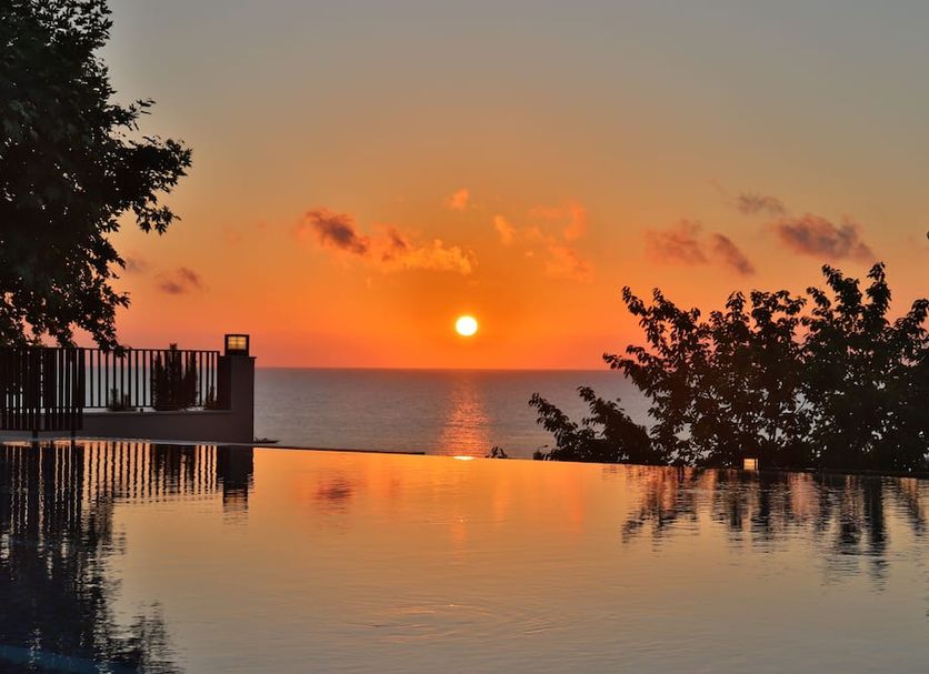 Sunset over the infinity pool at The Sign Degirmen Hotel&Spa Wellness in Şile, overlooking the sea