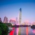 Shenzhen skyline at dusk with tower reflections in a lake, near Home Inn Neo Shenzhen Dongmen Pedestrian Street Shaibu Metro Station