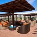 Meliá Llana Beach Resort & Spa rooftop lounge with wicker seating in Santa Maria