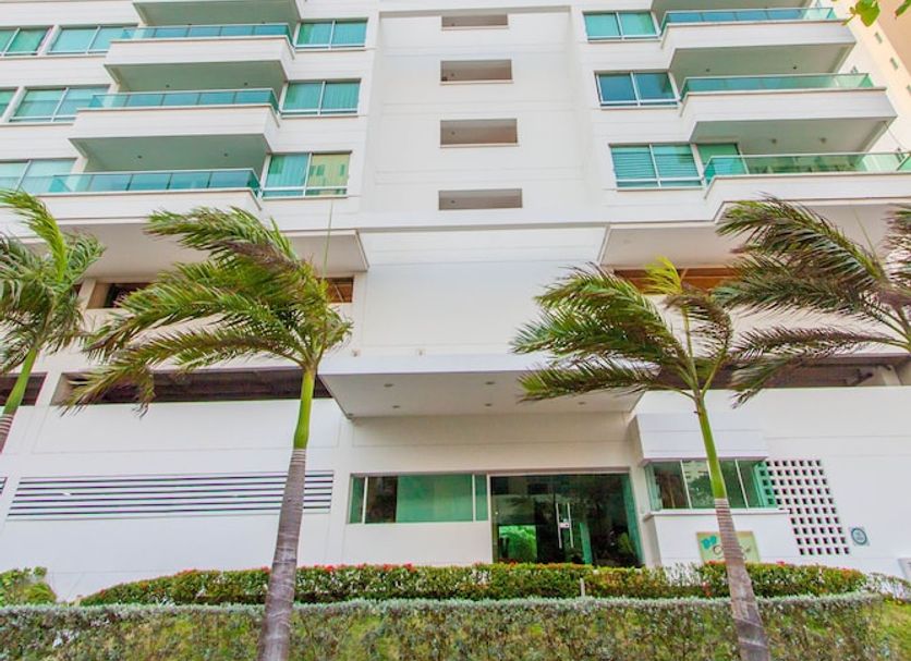 Travelers Orange Cartagena high-rise hotel in Cartagena with balconies and palm trees