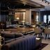 Sheraton Nashville Brentwood lobby lounge with plush seating, tables, and modern lighting in Brentwood