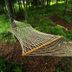 The Inn at Little Sister Hill in Sister Bay: rope hammock in a wooded outdoor area