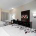 Red Roof Inn Raleigh Southwest - Cary guest room with two beds and TV in Cary
