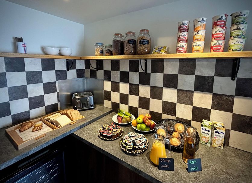 The Stag Rooms, Alcester breakfast counter with pastries, fruit, cereals and juice