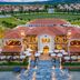 Centara Mirage Resort Mui Ne in Phan Thiet, aerial view of a terracotta-roofed resort with landscaped grounds
