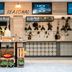 Kents Hill Park Training & Conference Centre in Milton Keynes with a seasonal café counter and hanging lights