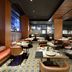 Aurea Catedral by Eurostars Hotel Company restaurant in Granada with set dining tables and warm wood decor