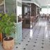 allsun Hotel Paguera Vera Beach dining area in Peguera with tiled floor, potted plant and tables