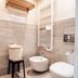 LE 5 Terre LA Spezia bathroom with walk-in shower, bidet, sink, and towel radiator