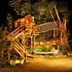 Hospedium Hacienda Las Cavas in Olmedo with a wooden playground tower and slide at night